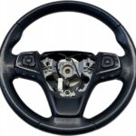 AVENSIS T27 LIFT T29 KIEROWNICA SKÓRZANA MULTIFUNKCYJNA PRZYCISKI ŁOPATKI