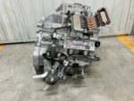 COROLLA E21 1.8 HYBRYDA AUTOMATYCZNA SKRZYNIA BIEGÓW CHŁODNICZKA 1NM P610 - obrazek 7