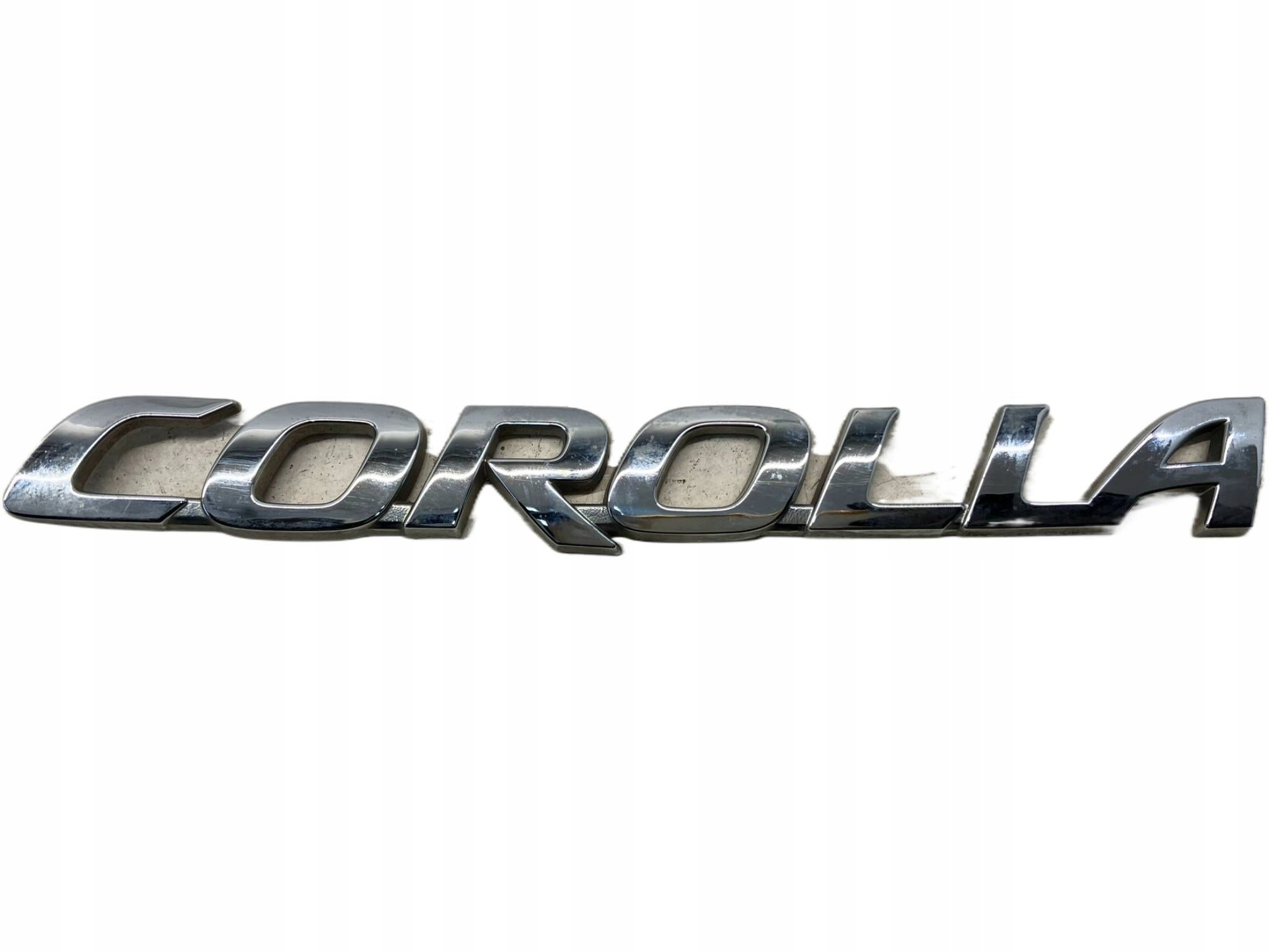 allegro-62bc0149af4985ec3c5cb2a7 COROLLA E21 HATCHBACK NAPIS EMBLEMAT LOGO KLAPY TYLNEJ POKRYWY BAGAŻNIKA - obrazek 1