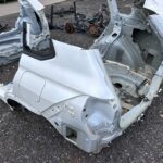 COROLLA CROSS BŁOTNIK TYLNY LEWY PRAWY PAS WANNA CAŁY TYŁ CIĘTY