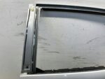 COROLLA E21 HATCHBACK DRZWI TYLNE LEWY TYŁ GOŁE USZKODZONE - obrazek 2