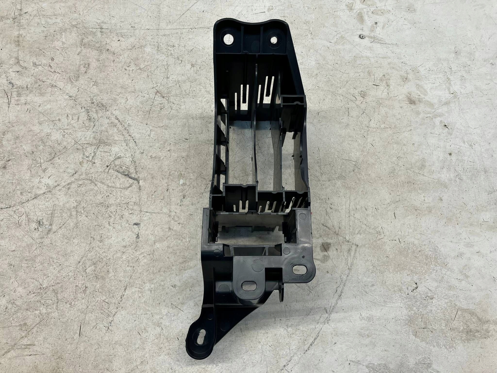 allegro-c9c11d065cdd5161b13c0ef9 COROLLA E21 KASETA MOCOWANIE UCHWYT MODUŁU ZA SCHOWKIEM 82877-02090 - obrazek 1