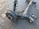 YARIS III LIFT 1.5 BENZYNA ZAWIESZENIE TYLNE BELKA TYŁ OŚKA OŚ TYLNA BĘBNY - obrazek 6