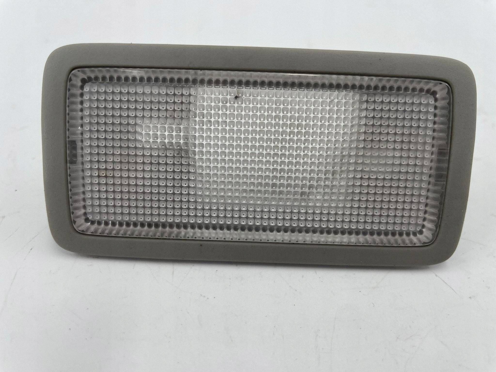 allegro-8a418bd9bbfbfe9f1ab4a15b AVENSIS T27 LAMPKA OŚWIETLENIA WNĘTRZA OPRAWKA LEWA PRAWA SZARA 81340-30100 - obrazek 1