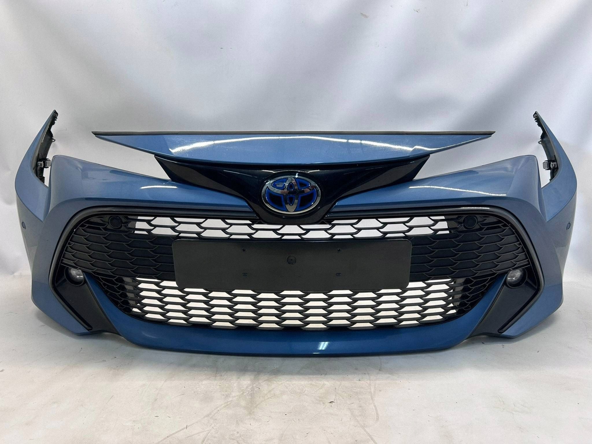 allegro-a775cdac43c7d28c9e999726 COROLLA E21 KOMBI HATCHBACK ZDERZAK PRZÓD PRZEDNI 6x PDC KOMPLETNY 8U6 - obrazek 1