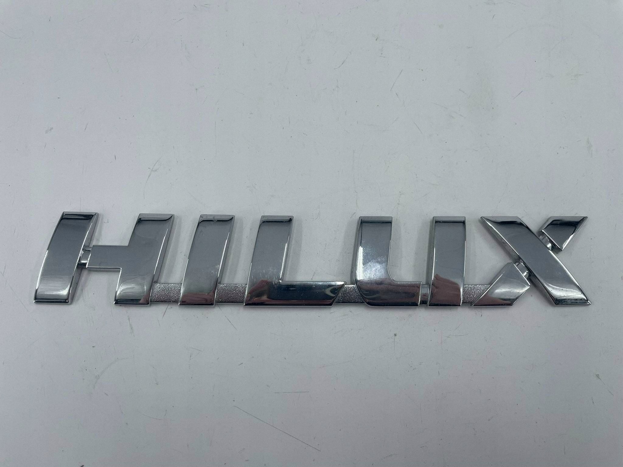 allegro-cfee23ae4937853b882efaf1 TOYOTA HILUX NAPIS LOGO EMBLEMAT ZNACZEK - obrazek 1