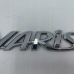 TOYOTA YARIS NAPIS LOGO EMBLEMAT ZNACZEK