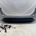 YARIS CROSS ZDERZAK TYLNY TYŁ 4x PDC DOKŁADANE WIĄZKA 1L0